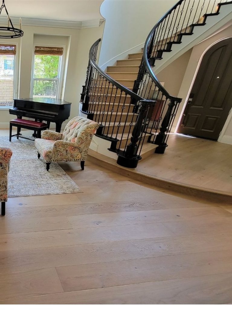Custom stairs and hardwood floors after