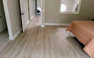 master bedroom after new plank flooring